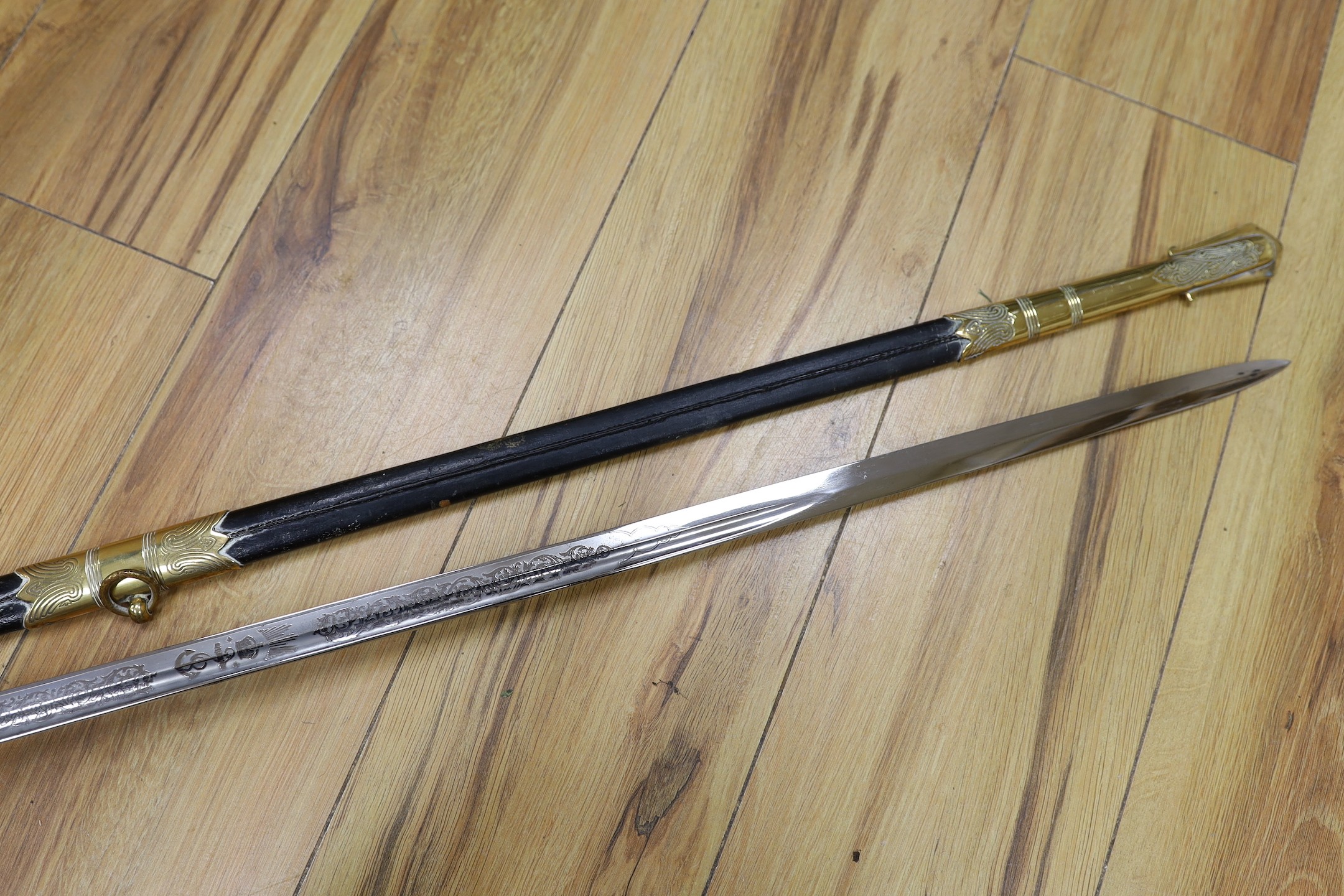 A QEII Naval officer's dress sword and scabbard
